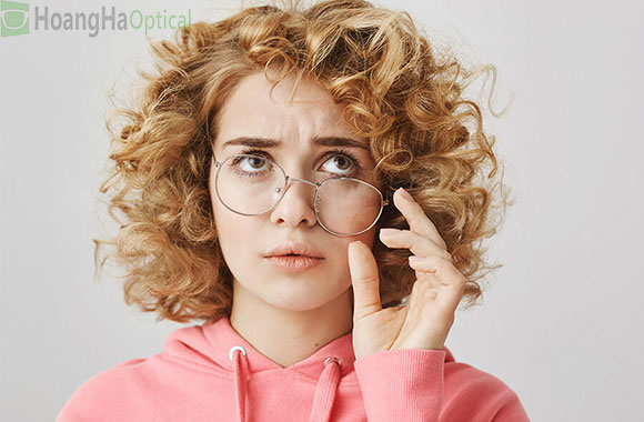 girl adjust glasses