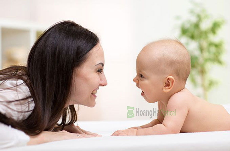 mother and baby making eye contact hero compressor